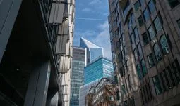 An electronic trading firm cut headcount and raised pay to £535k in London