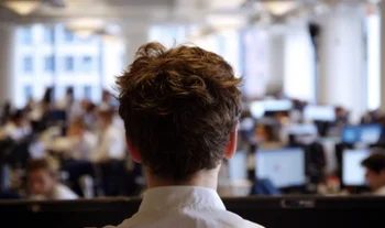 a banking intern seen from behind 